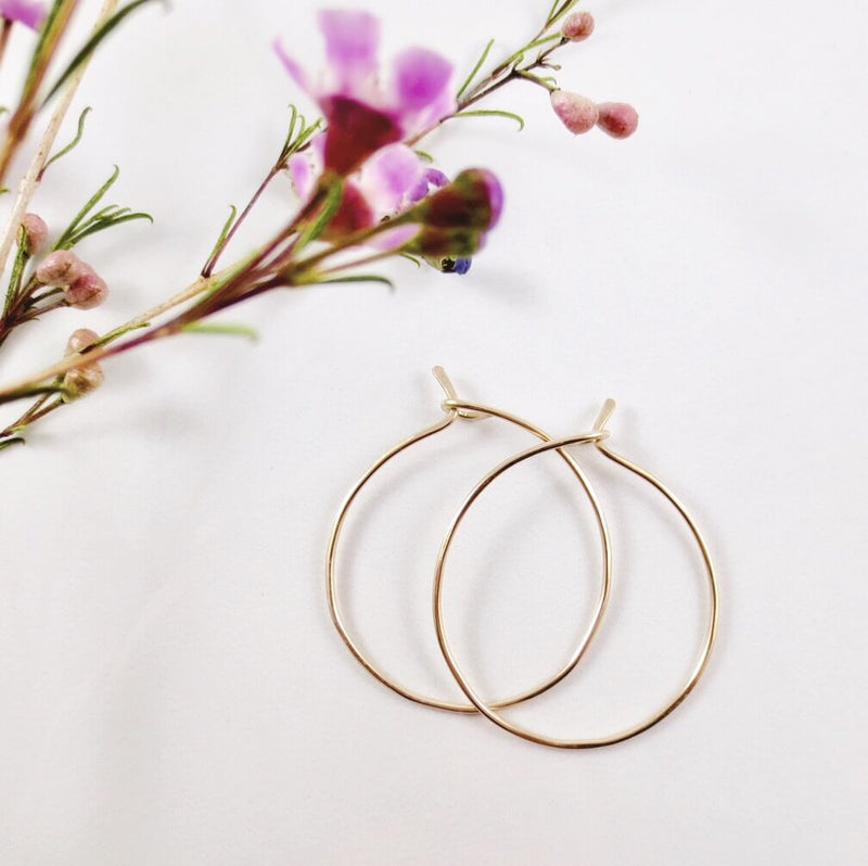 light weight hoop earing in gold or silver